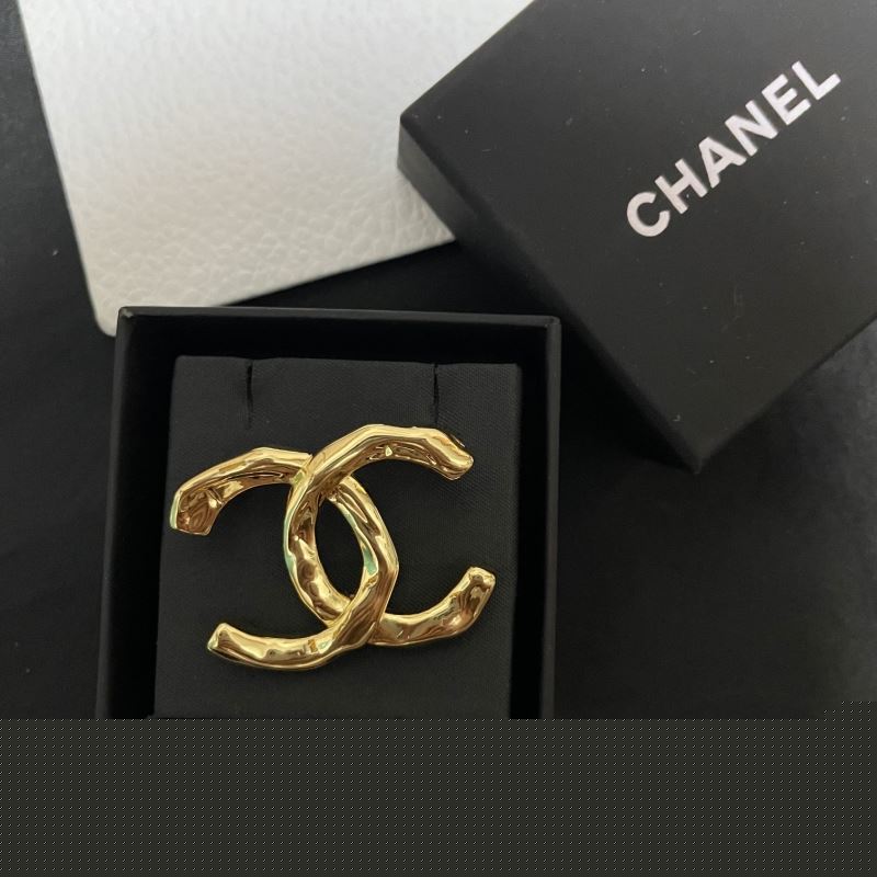 Ch*el brooches